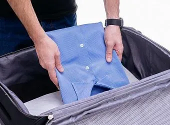 Как упаковать рубашку в чемодан