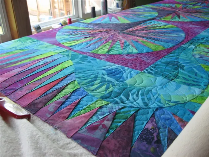 фиолетовое самодельное одеяло