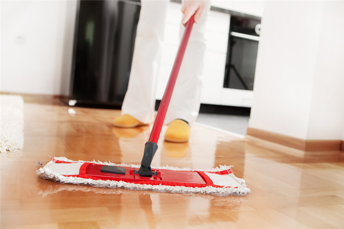 bigstock-House-cleaning-Mopping-hardwo-15356912